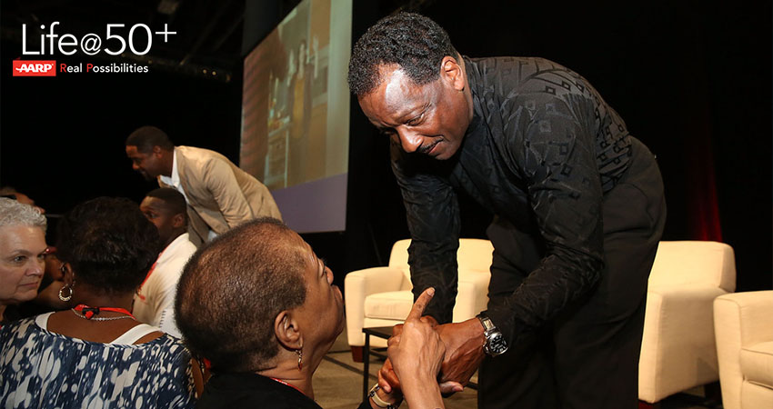 Donnie Simpson greeting fans who attended Life After 50+ AARP event