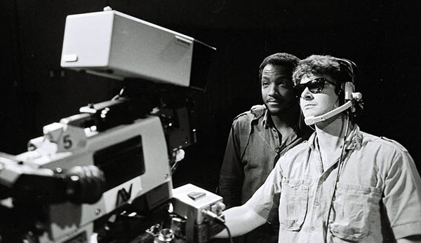 Donnie with film producer behind camera